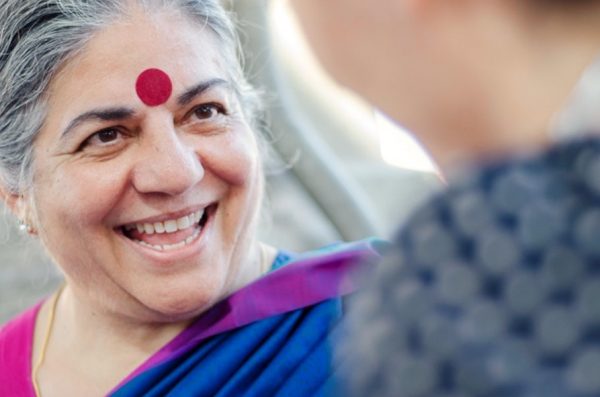 Vandana Shiva smiling in violet clothing