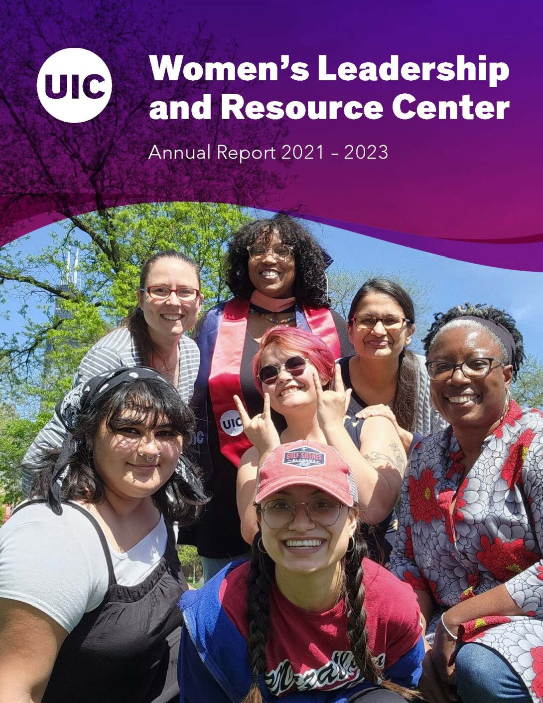 The front cover of WLRC's 2021-2023 Annual Report, which features a group photo of WLRC staff taken outdoors in May 2023.